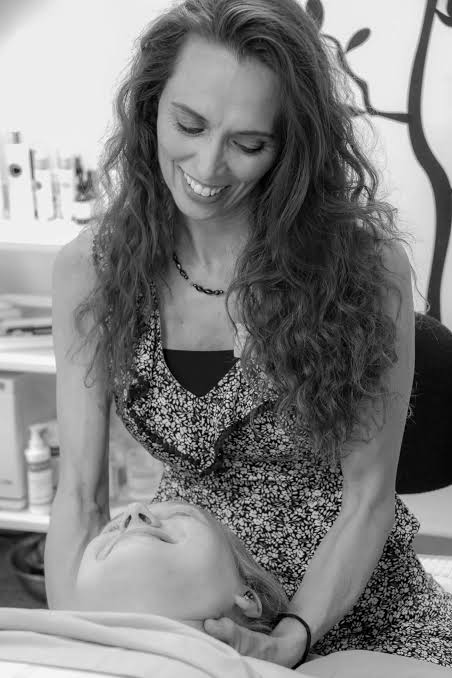 Heidi providing therapeutic massage in her studio